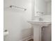 Powder room features a pedestal sink, a mirror, and modern fixtures at 253 Bent Green Ct. # 70D, Murrells Inlet, SC 29576
