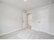 Bedroom features neutral walls, plush carpet, and paneled doors at 253 Bent Green Ct. # 70D, Murrells Inlet, SC 29576