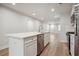 Modern kitchen featuring white cabinets, stainless steel appliances, and bright lighting at 253 Bent Green Ct. # 70D, Murrells Inlet, SC 29576