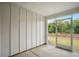 Enclosed patio with white siding and a screened entry at 253 Bent Green Ct. # 70D, Murrells Inlet, SC 29576