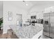 Modern kitchen featuring stainless steel appliances, granite countertops, and ample cabinet space at 259 Stillbrook Dr., Longs, SC 29568