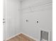 Functional laundry room with a utility sink, washer hookups, and practical storage solutions at 259 Stillbrook Dr., Longs, SC 29568