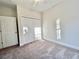 Bedroom featuring carpet flooring, neutral walls, and a closet at 2593 Main St., Loris, SC 29569