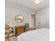 Bedroom featuring two chairs, a dresser with a mirror, and hardwood floors at 2604 South Bay St., Georgetown, SC 29440