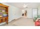 Sun Room featuring a door, an area rug, hardwood floors, and a bookcase at 2604 South Bay St., Georgetown, SC 29440