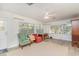 Sun Room featuring a ceiling fan, an area rug, windows, and three chairs at 2604 South Bay St., Georgetown, SC 29440