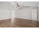 Spacious living room featuring high ceilings, hardwood floors, and access to other rooms at 263 Stillbrook Dr., Longs, SC 29568