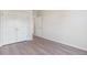 Bedroom features a closet with double doors and light wood flooring at 268 Stillbrook Dr., Longs, SC 29568