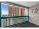 Balcony seating area with views of buildings, ocean, and palm trees at 2700 S Ocean Blvd. # A-3, North Myrtle Beach, SC 29582