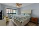 Comfortable bedroom with balcony access and ceiling fan at 2700 S Ocean Blvd. # A-3, North Myrtle Beach, SC 29582