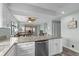 Spacious kitchen with granite countertops and stainless steel dishwasher at 2700 S Ocean Blvd. # A-3, North Myrtle Beach, SC 29582