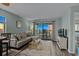 Bright living room with comfortable seating, view of balcony with ocean view and modern furnishings at 2700 S Ocean Blvd. # A-3, North Myrtle Beach, SC 29582