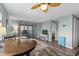 Cozy living room with ceiling fan, balcony access, and stylish furnishings at 2700 S Ocean Blvd. # A-3, North Myrtle Beach, SC 29582