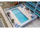 Aerial view of the community swimming pool with lounge chairs and well-maintained landscaping at 2700 S Ocean Blvd. # A-3, North Myrtle Beach, SC 29582