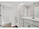 Bright bathroom with double vanity and view of the shower at 275 Stillbrook Dr., Longs, SC 29568