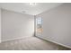 Cozy bedroom with carpet flooring, neutral wall paint and a window for natural light at 275 Stillbrook Dr., Longs, SC 29568