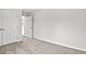 Neutral bedroom featuring carpeted floors and open door to hallway at 275 Stillbrook Dr., Longs, SC 29568