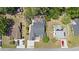 Aerial view of the property showcasing the house, surrounding landscape, and neighborhood at 284 Nature Trail, Little River, SC 29566