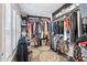 Spacious walk-in closet with custom shelving and ample storage space, with a window offering natural light at 284 Nature Trail, Little River, SC 29566