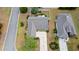 An aerial view showcasing a well-maintained home, fenced yard, and landscaped surroundings at 3136 Robins Nest Way, Myrtle Beach, SC 29579