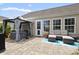 Back patio featuring a hot tub, outdoor seating, and a covered gazebo perfect for entertaining at 3136 Robins Nest Way, Myrtle Beach, SC 29579