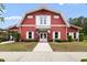 Exterior view of the community clubhouse, with red siding and white trim at 3136 Robins Nest Way, Myrtle Beach, SC 29579