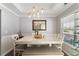 Dining area featuring a modern light fixture and stylish decor for memorable meals at 3136 Robins Nest Way, Myrtle Beach, SC 29579