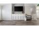 Bright living area showcasing contemporary design with sleek built-in shelving and ample open space for versatile living at 3136 Robins Nest Way, Myrtle Beach, SC 29579
