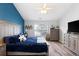 Spacious main bedroom featuring decorative wall with seahorse accents and lots of natural light at 3136 Robins Nest Way, Myrtle Beach, SC 29579