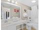 Bright bathroom with a shower and tub combo, white vanity, and modern fixtures at 3401 N Ocean Blvd. # 309, North Myrtle Beach, SC 29582