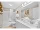 Well-lit bathroom with double vanity, clean white fixtures, and nautical-themed accents at 3401 N Ocean Blvd. # 309, North Myrtle Beach, SC 29582