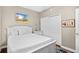 Bedroom with a queen bed and beach themed decor at 3401 N Ocean Blvd. # 309, North Myrtle Beach, SC 29582