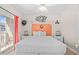Bedroom with a queen bed, balcony access, and coastal decor at 3401 N Ocean Blvd. # 309, North Myrtle Beach, SC 29582