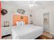 Bedroom featuring a queen bed and coastal decor at 3401 N Ocean Blvd. # 309, North Myrtle Beach, SC 29582