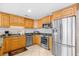 Modern kitchen featuring stainless steel appliances, granite countertops, and ample cabinet space at 3401 N Ocean Blvd. # 309, North Myrtle Beach, SC 29582