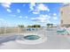 Elevated pool area features both a pool and a hot tub with ocean views, inviting relaxation at 3401 N Ocean Blvd. # 309, North Myrtle Beach, SC 29582