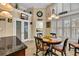 Breakfast nook with bright lighting, views to the exterior, and access to a large pantry at 372 Waterfall Circle, Little River, SC 29566