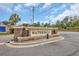 Community entrance with a waterfall feature and stone signage at 'Waterfall' subdivision entry at 372 Waterfall Circle, Little River, SC 29566