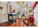 Sitting area boasts a fireplace, hardwood floors, and lots of natural light at 372 Waterfall Circle, Little River, SC 29566