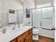 Bathroom features a single sink vanity, a toilet, and a shower with sliding glass doors at 3802 Seedling Ct., North Myrtle Beach, SC 29582