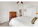 Bright bedroom with a ceiling fan, a large closet, and a bed with white bedding at 3802 Seedling Ct., North Myrtle Beach, SC 29582