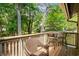 Deck area with furniture and views of lush landscaping and the neighborhood at 400 Melrose Pl. # 14E, Myrtle Beach, SC 29572
