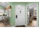 Bright entryway showcasing a front door leading to a view of the bedroom, enhancing the home's appeal at 400 Melrose Pl. # 14E, Myrtle Beach, SC 29572