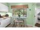 Eat-in kitchen features a breakfast nook with bright, natural light at 400 Melrose Pl. # 14E, Myrtle Beach, SC 29572