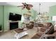 Comfortable living room with a fireplace, coastal accents, and a relaxed seating arrangement for easy living at 400 Melrose Pl. # 14E, Myrtle Beach, SC 29572