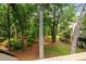 Elevated view of the lushly treed neighborhood and surrounding landscaping at 400 Melrose Pl. # 14E, Myrtle Beach, SC 29572