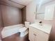 Bathroom featuring a shower-tub combo, toilet, sink, and vanity at 401 Alder St., Myrtle Beach, SC 29577
