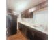 Kitchen with dark cabinetry and modern appliances at 401 Alder St., Myrtle Beach, SC 29577