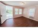 Living room with wood floors and a door to the outside at 401 Alder St., Myrtle Beach, SC 29577