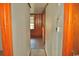 View of the hallway showcasing wood trim and wall paneling details at 414 E Wine St., Mullins, SC 29574